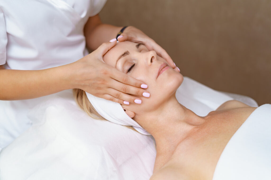 Woman receiving anti-aging facial