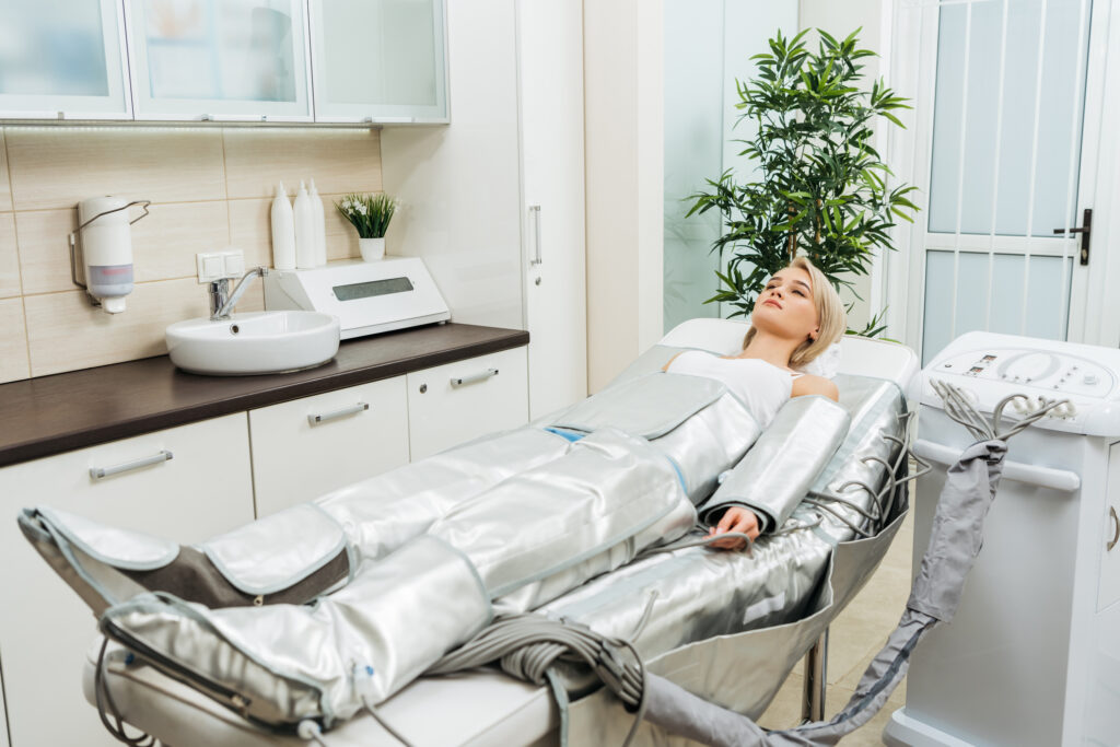 Woman undergoing pressotherapy