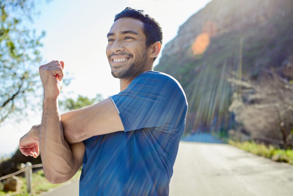 Man exercising outdoors to support healthy living